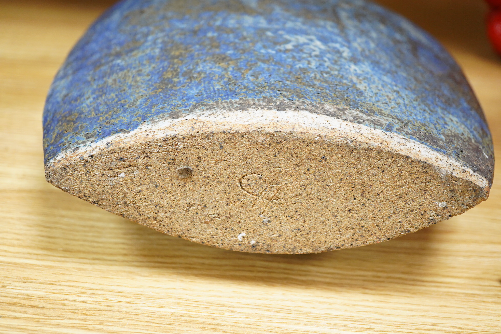 A large blue glazed pottery bottle and stopper, circa 1960's/80's, indistinct incised initials to the base, 37cm high